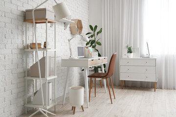 Modern stylish workplace with laptop in office