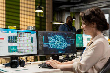Businesswoman employs neural networks systems for data analysis and forecasting, combining AI automation tools and digitalization to drive efficiency and innovation in firm operations.