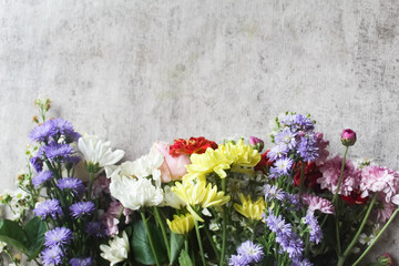 various kinds of flowers as a background with negative space. floral background.