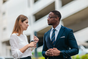 Street-Side Strategy Session Between Corporate Leaders