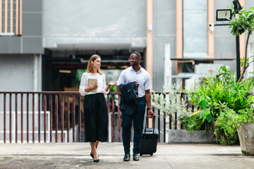 Urban Business Travelers with Luggage © SpaceOak