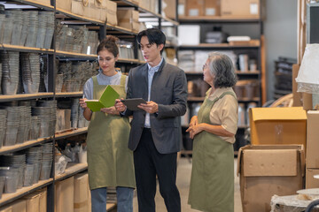 Asian Male Investor Touring Family-Run Ceramic Warehouse for Partnership Deal