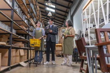 Fototapeta premium Asian Male Investor Touring Family-Run Ceramic Warehouse for Partnership Deal