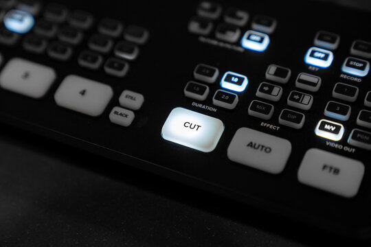 Mini Pro video switcher with illuminated buttons, professional live streaming and video production equipment for broadcasting, podcasting, online events, studio control, and digital content creation.