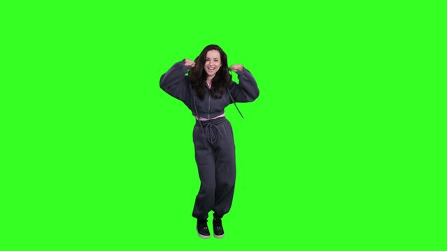 Smiling pretty woman modern dancing in the studio on the chroma key - Powered by Adobe
