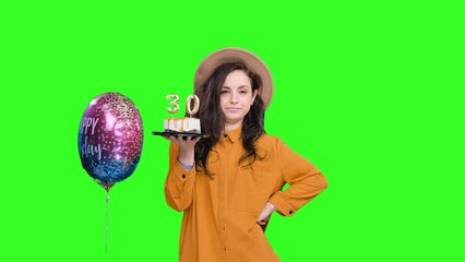 Fototapeta premium Stylish woman celebrating with birthday cake with number 30 on the chroma key