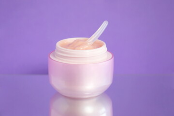 Pink cosmetic jar, face cream, skin care product, beauty product