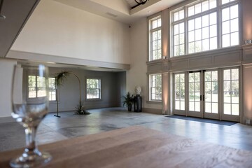 Bright empty wedding venue interior with natural light