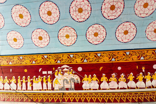 Beautiful fresco depicting the Esala Perahera procession of the sacred tooth in a golden casket with song and dance at the Temple of the Tooth,Sri Dalada Maligawa,built in 1595 in Kandy,Sri Lanka