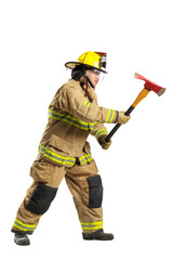 Firefighter in protective gear holding fire axe isolated on white