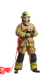 Firefighter kneeling with fire hose nozzle in protective gear on white