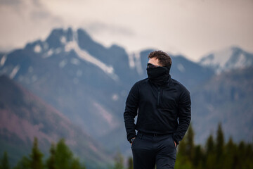 Man enjoys hiking adventure trip in Denali national Park