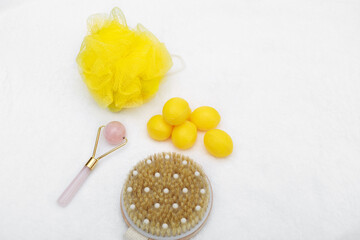 spa, healthy, hygiene background with beauty tools isolated on white grayish fluffy towel 