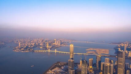 Macau Peninsula and Zhuhai Cityscape Aerial View at Golden Hour with Bridges and Skyscrapers