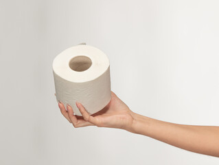 hand holding toilet paper
