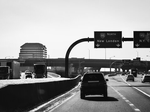 Roadtrip through New Haven on I‑95 Interstate Highway in Connecticut, captured in a black and white retro‑style photo.