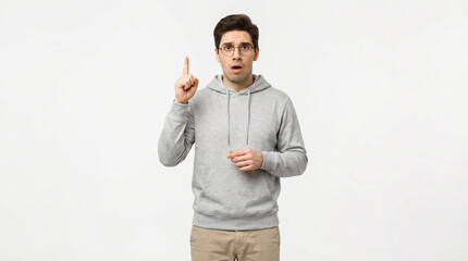 Man with an idea raising index finger Eureka moment problem solving concept surprise expression