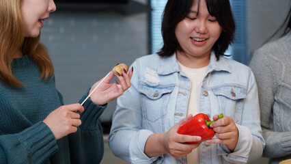 Cooking Party: Friends Preparing Healthy Meal Together in Modern Kitchen