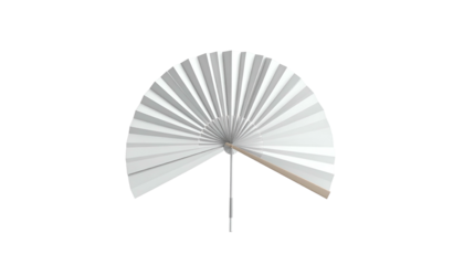 Overhead view of a partially-opened white fan on a black background