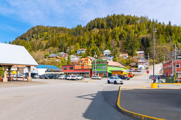 The seaside historic logging and mining town of Ketchikan Alaska, with colorful shops and buildings along the harbor and cruise port.