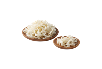 Dried Kwetiaw or Char Kway Teow served on wooden plates, isolated against a white background. Chinese rice noodle.

