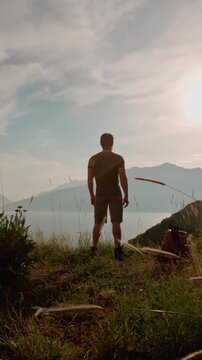 mindful man at mountain sunrise meditation slow motion spiritual awakening nature connection