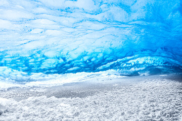 Obraz premium Blue Ice Cave Texture with Frozen Glacier Formations in Iceland. With ice texture and reflection