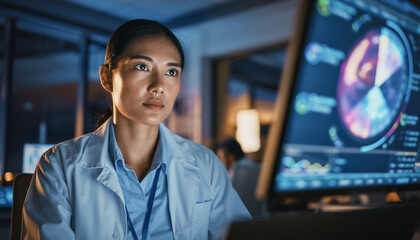 Medical researcher analyzing brain scan data in a high-tech laboratory.