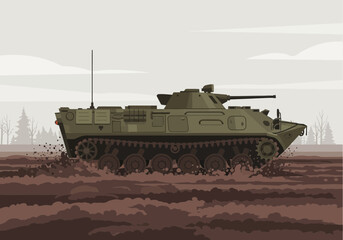 Obraz premium Armored personnel carrier moving through muddy terrain with trees in distance.