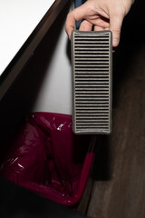 Comparison of clean and dirty cabin filters from a car.