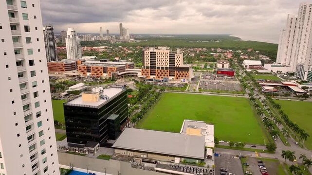 Aerial drone view moving towards Costa del este Town Center
