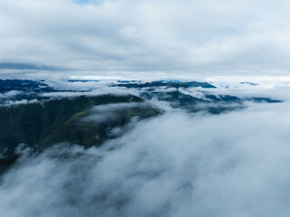 Obraz premium Beautiful foggy high altitude mountain landscape in China