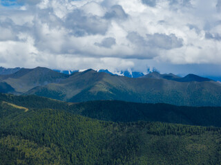 Fototapeta premium Beautiful foggy high altitude mountain landscape in China