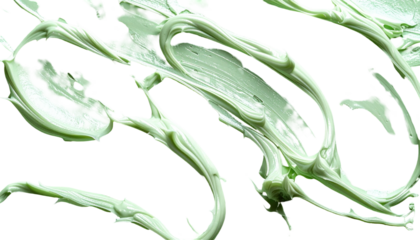 Close-up of pale green skincare product smeared on a black backdrop