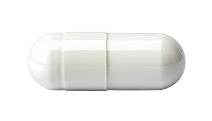 Close-up of a white, oblong capsule against a black backdrop