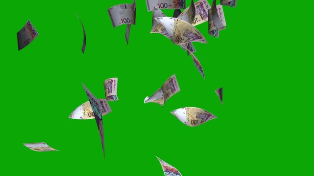 Flying 100 Malaysian Ringgit Banknote Falling in Air Isolated on green Background Money Concept
