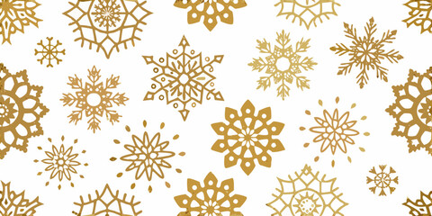 Golden snowflakes scattered across a white background creating a winter pattern
