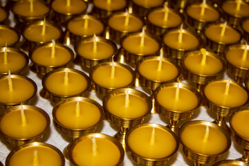 Buddhist Altar Candles at Religious 108 Butter Lamp Festival in Temple Monastery. Pouring Melted Butter Oil. Preparation process