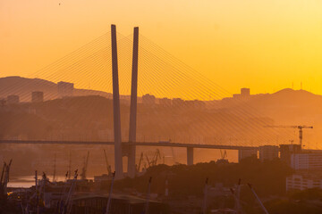 Golden bridge across the Golden Horn Bay in Vladivostok at dawn