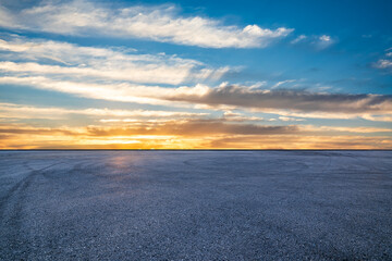 Fototapeta premium Empty asphalt road and beautiful sky clouds landscape at sunset