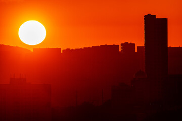 Urban development of Vladivostok at dawn. Bright dawn in Vladivostok.