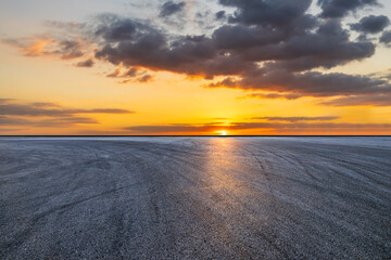 Empty asphalt road and beautiful sky clouds landscape at sunset