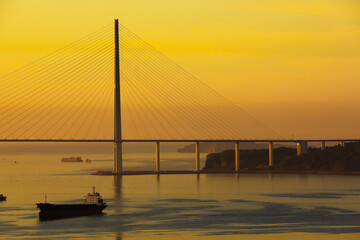 Russian bridge across the Bosphorus Strait East in Vladivostok at dawn