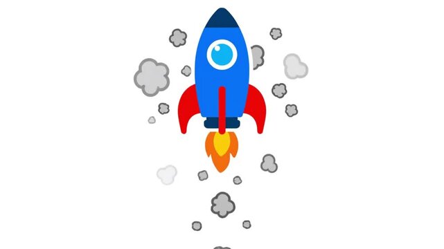 A blue toy rocket with red fins and orange flames blasts off into the air with gray smoke clouds on a white background.