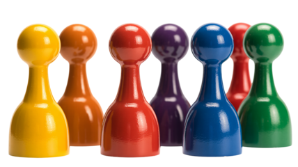 Vibrant collection of colorful wooden game pawns standing together against a stark isolation