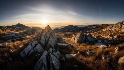 Dramatic mountain landscape at sunrise, rocky terrain, golden hour, wilderness, scenic view, nature photography