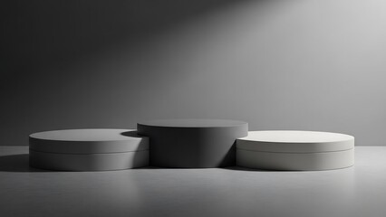 Modern monochrome podium with layered grey cylindrical platforms, concrete floor and gradient backdrop, minimal product display photography for premium branding