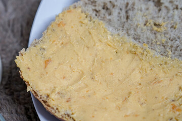 Bread with salted egg spread on a plate for healthy breakfast	