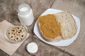 Bread with chicken floss on a plate for breakfast. Homemade bread with dried shredded chicken