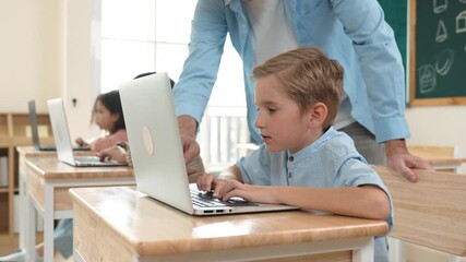 Caucasian teacher helping energetic boy coding engineering prompt while diverse student using software generated AI. Children sitting and programing system. Cute student learning about code. Pedagogy. - Powered by Adobe